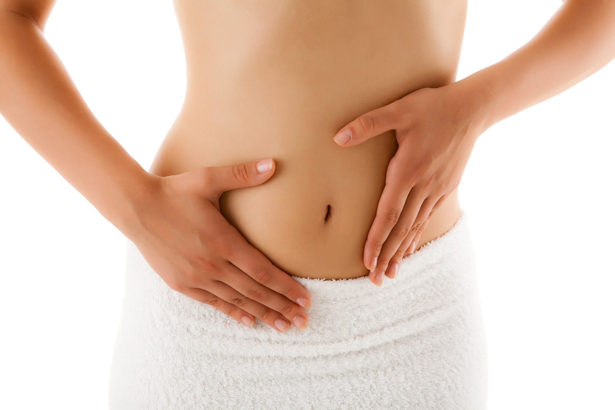 Woman With Both Hands On Belly Wearing Towel Below Waist